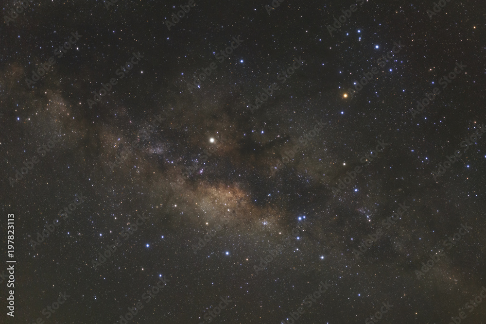Fototapeta premium Milky way galaxy with stars and space dust in the universe, Long exposure photograph, with grain.