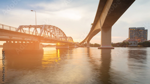 Canvas Print Bridge cross over river in Bangkok city during sunset