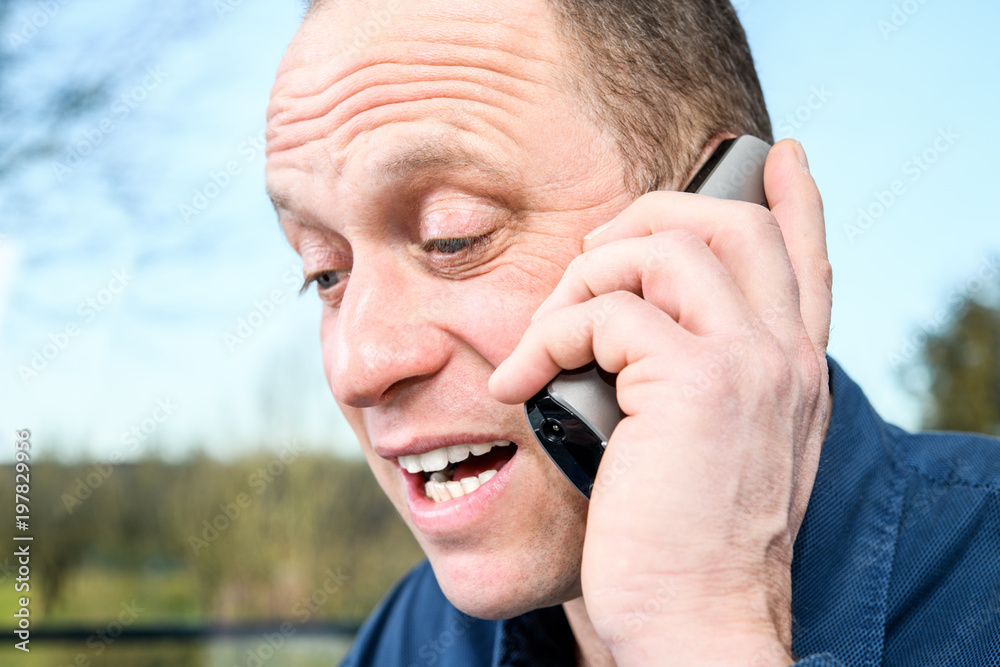 man calling with green phone