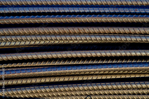 steel background, steel construction, construction irons for building, stack of ribbed steel
