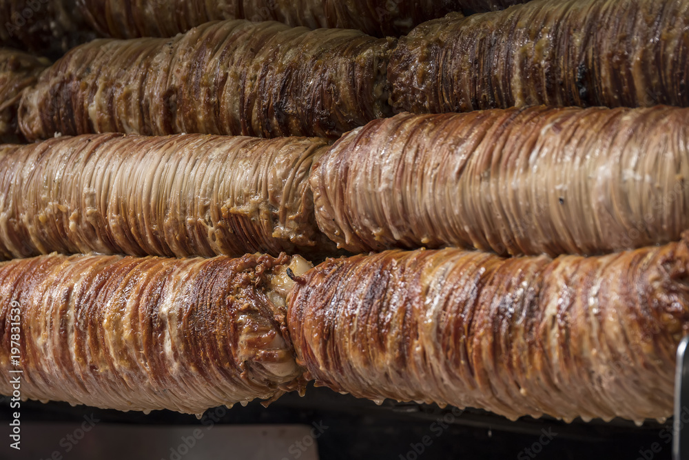 Turkish Street Food Kokorec made with sheep bowel cooked in wood fired oven.