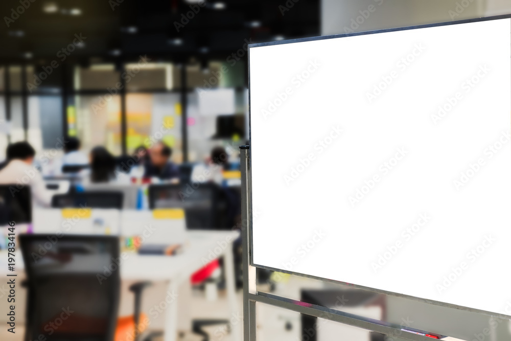 Blank whiteboard in front of worker who works in creative office, Business Meeting and Planning Concept.