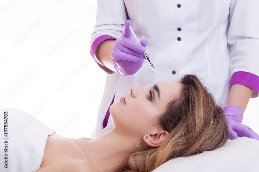 Fototapeta premium Beautician making injection in woman's face, closeup. Biorevitalization procedure
