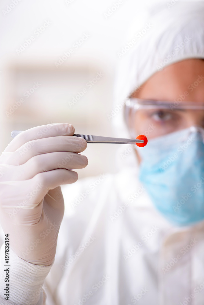 Lab assistant in drug synthesis concept Lab assistant in drug synthesis concept