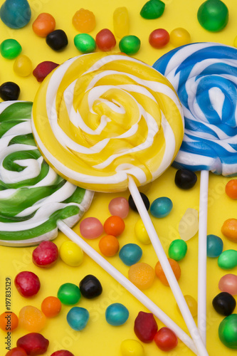 colorful spiral lollipops on colorful backgrounds