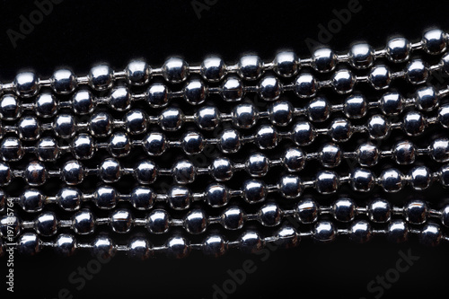 chain of balls on a black background