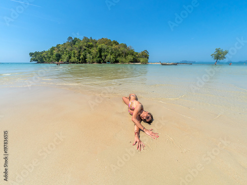 woman resting at the  tropical beach of Klong Muang in Thailand