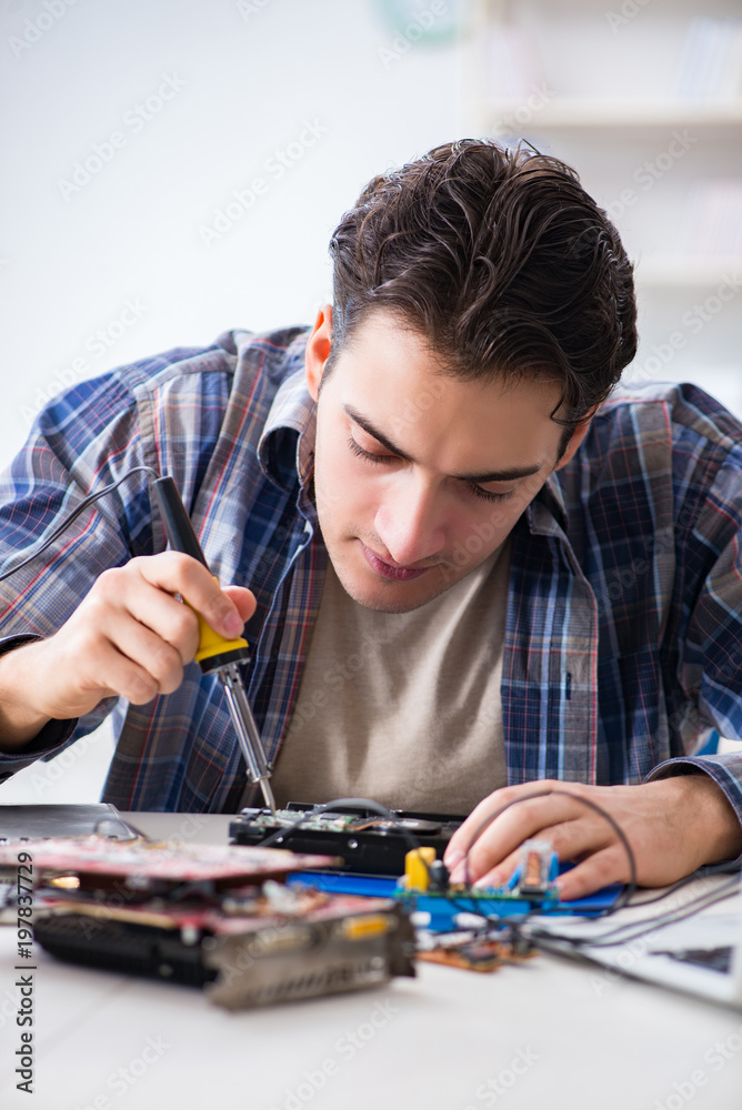 Computer hardware repair and fixing concept by experienced techn Computer hardware repair and fixing concept by experienced techn