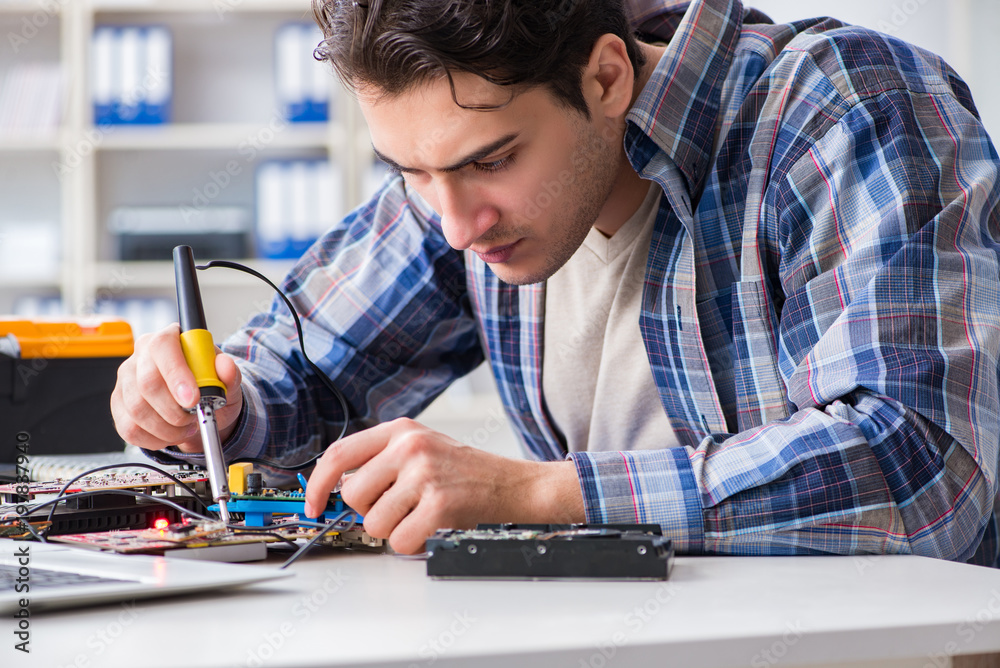 Computer hardware repair and fixing concept by experienced techn Computer hardware repair and fixing concept by experienced techn