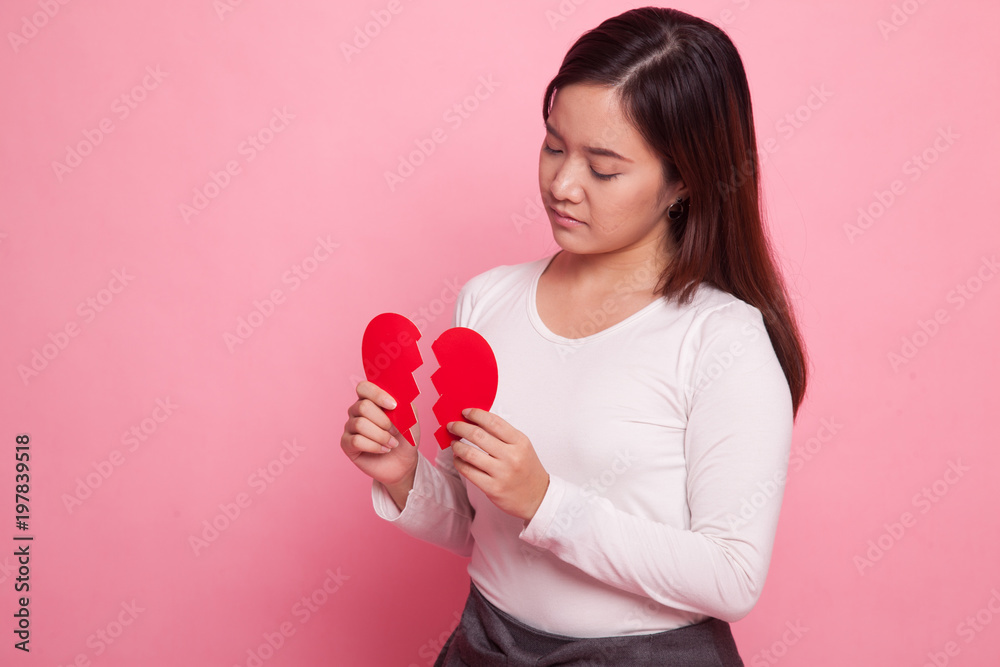 Beautiful young Asian woman with broken heart. Beautiful young Asian woman with broken heart.