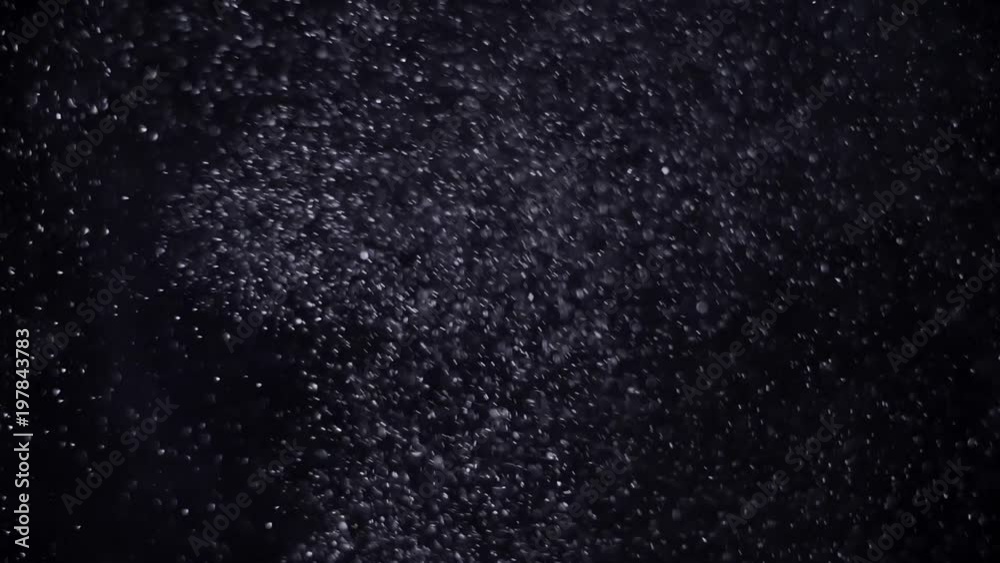 Slow moving real particles on black background. Slow moving real particles on black background.