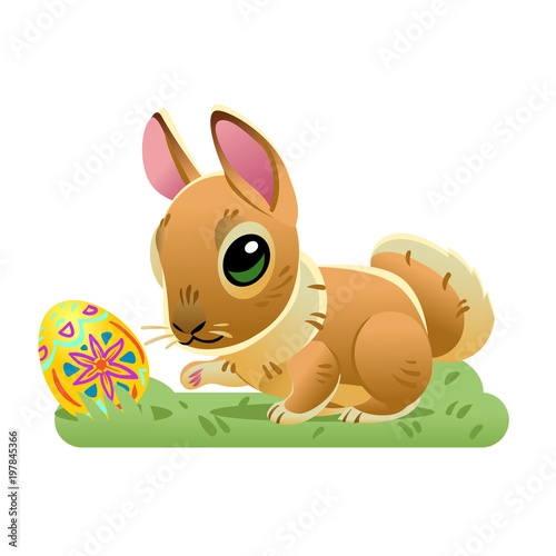 Easter bunny with the egg on the grass. Vector cartoon illustration isolated on white background. Cute rabbit character for the holiday design and cards.