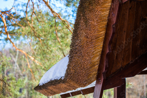 wooden straw roof with selective focus background photo