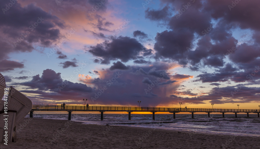 silhouetted pier at sunset gral moritz baltic sea germany silhouetted pier at sunset gral moritz baltic sea germany