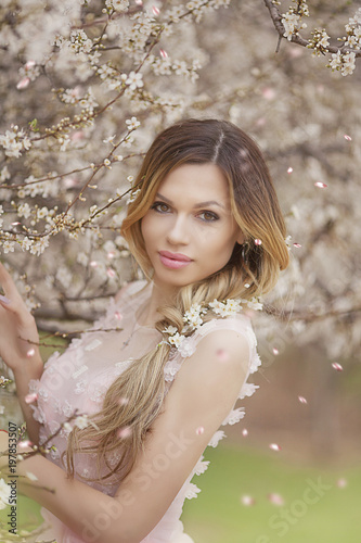 Beautiful natural woman in the garden of flowers © olenakucher