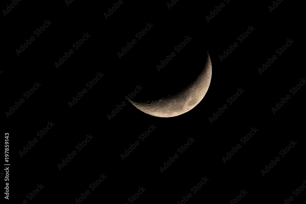 Waning moon and its craters from earth Waning moon and its craters from earth