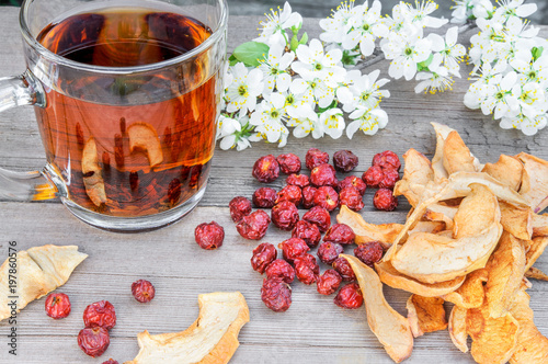 Dried dog rose, rosehips, apples and tea photo