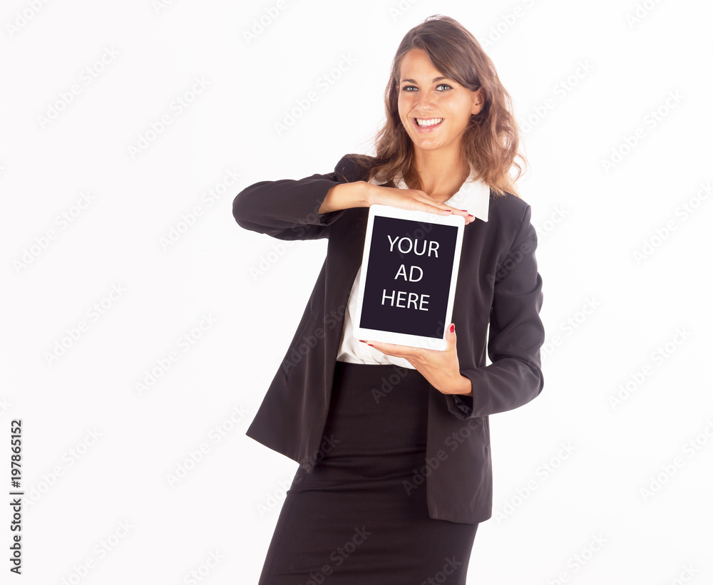 Beautiful young business woman working with a tablet; copy space photo, customizable tablet screen Beautiful young business woman working with a tablet; copy space photo, customizable tablet screen