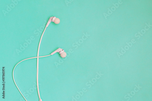 headphone on modern pastel backgrounds. top view, copyspace. Trendy colorful photo. Minimal style with colorful paper backdrop.