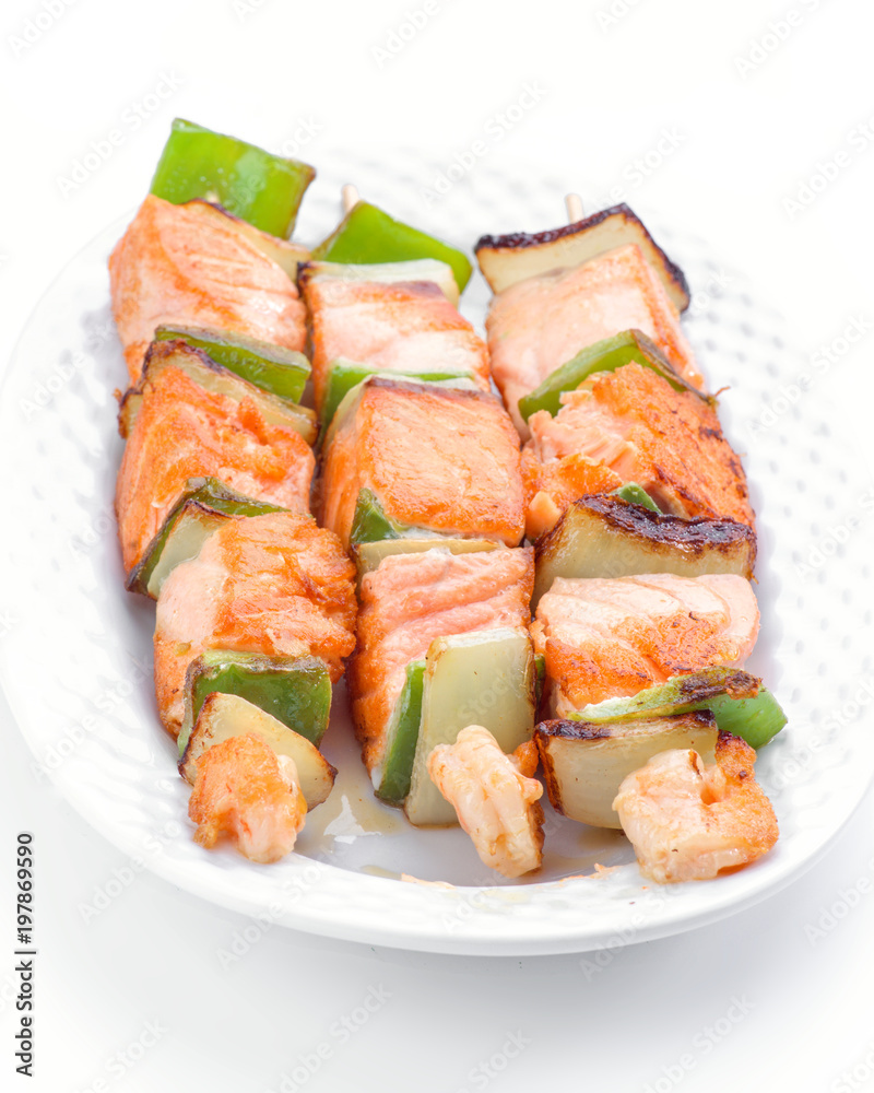 grilled salmon skewers in white font, isolated on white grilled salmon skewers in white font, isolated on white