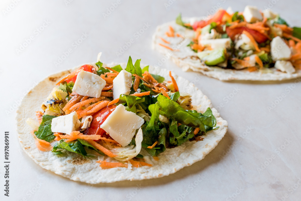 Homemade Vegetarian Tostadas with Salad, Cheese and Grated Carrot Slices