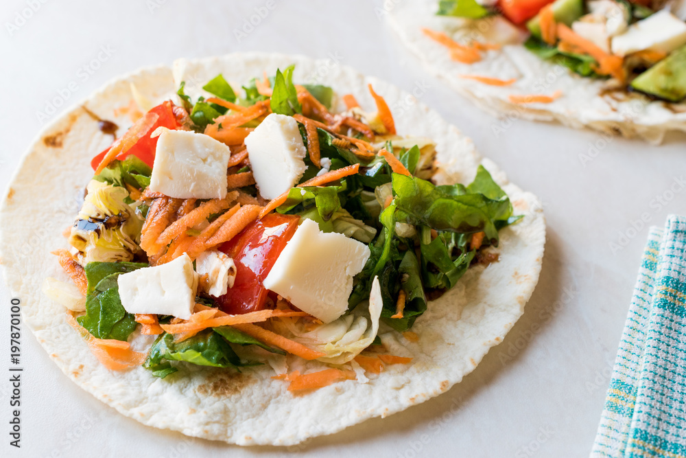 Homemade Vegetarian Tostadas with Salad, Cheese and Grated Carrot Slices