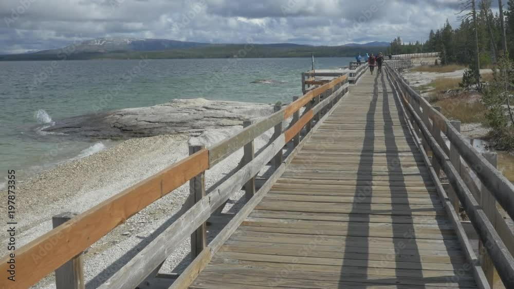 Boardwalk near a lake in Yellowstone National Park Boardwalk near a lake in Yellowstone National Park