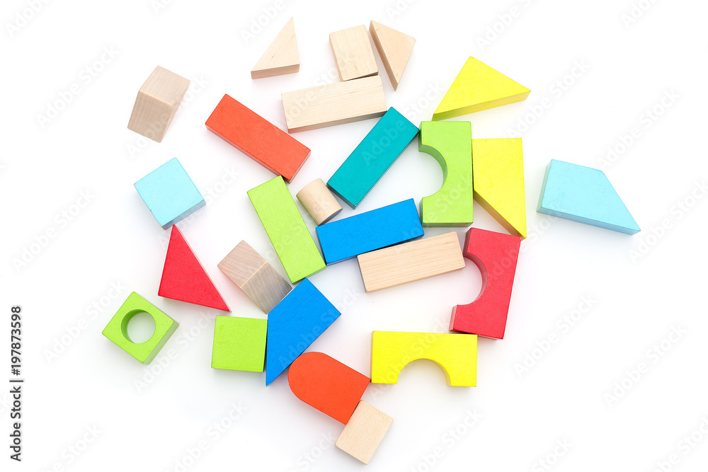 Wooden toy cubes on a white background. Isolated Wooden toy cubes on a white background. Isolated