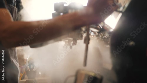 Blast of Steam on Professonal Coffee Machine. Barista Working in Coffeeshop. 4K, Slowmotion. photo