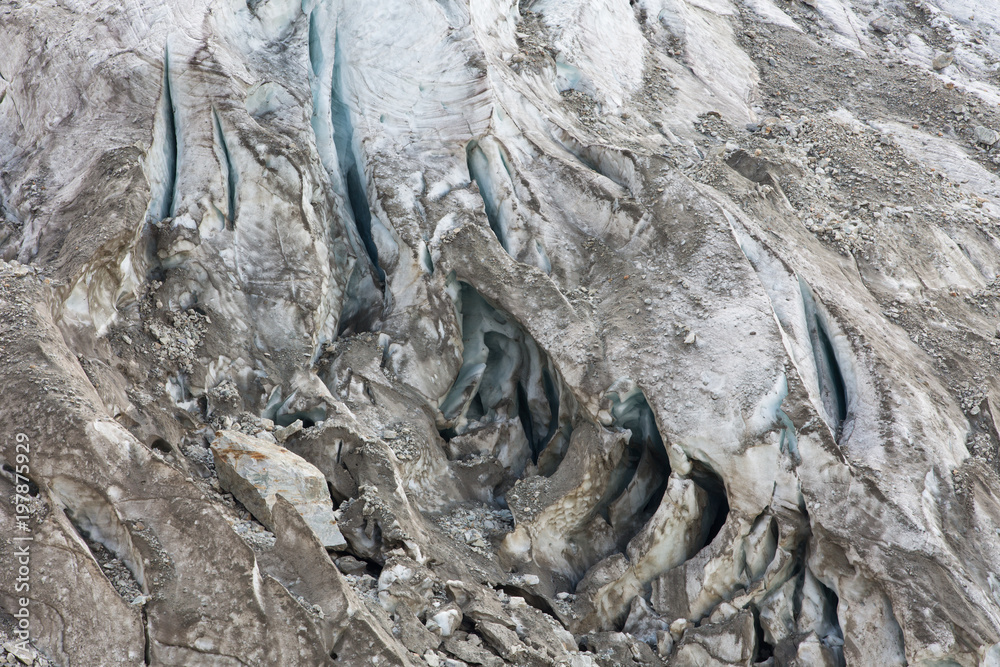 Aerial view of show and ice of Kashkatash Glacier on the west Caucasian mountains in Russia. Aerial view of show and ice of Kashkatash Glacier on the west Caucasian mountains in Russia.