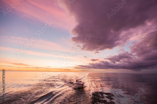 boat at sunset © Artem Zakharov