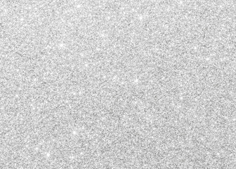 Silver glitter texture white sparkling shiny wrapping paper background for Christmas holiday seasonal wallpaper decoration, greeting and wedding invitation card design element