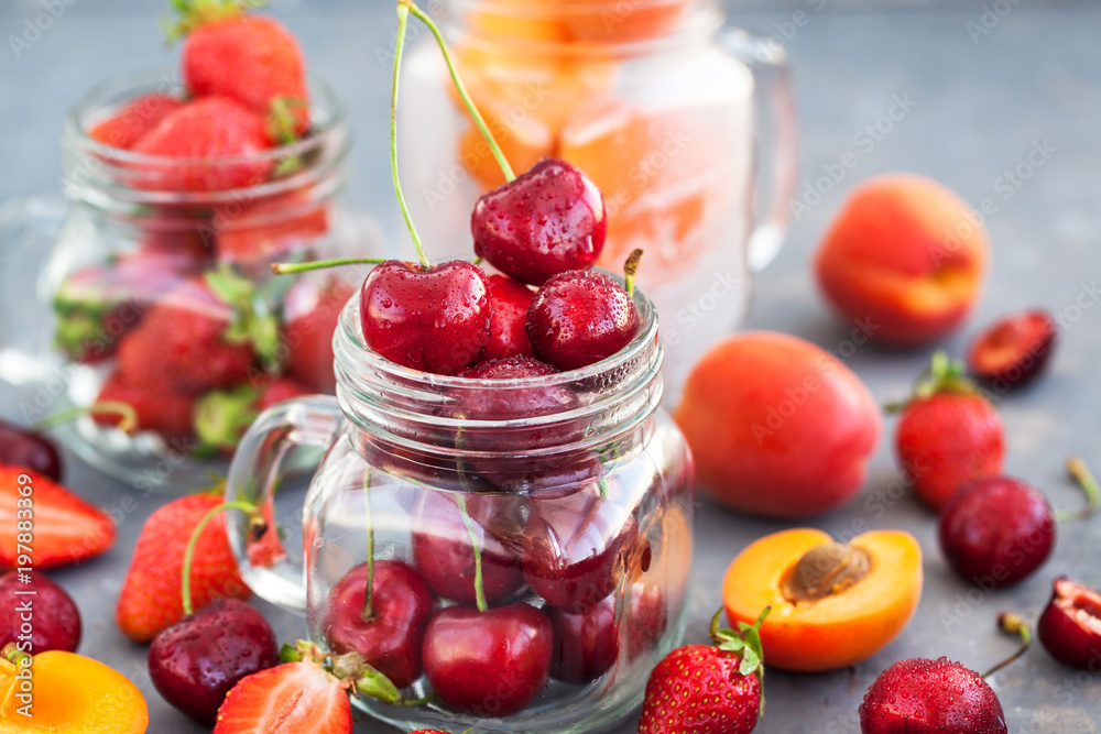 Fresh ripe summer cherry, strawberry and apricots Fresh ripe summer cherry, strawberry and apricots