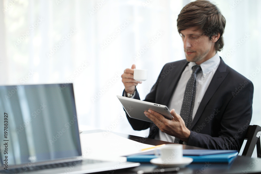 Business man with tablet computer Business man with tablet computer