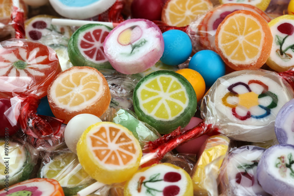 candies with jelly and sugar. colorful array of different childs sweets and treats. candies with jelly and sugar. colorful array of different childs sweets and treats.