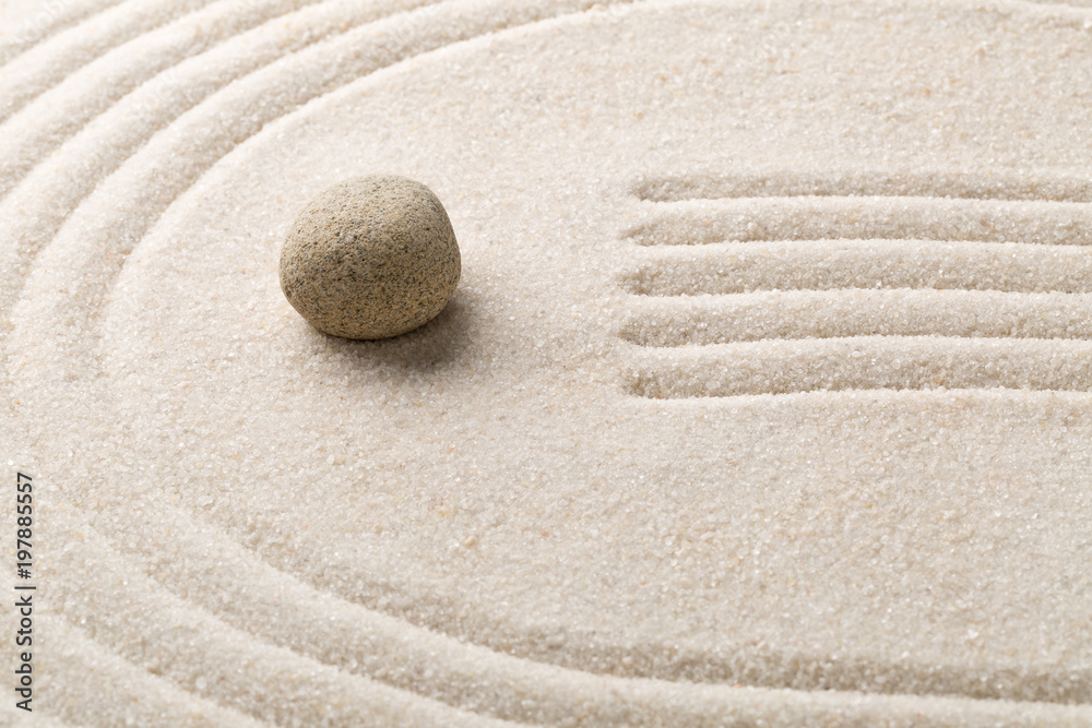 Zen sand and stone garden with raked lines and curves. Simplicity, concentration or calmness abstract concept Zen sand and stone garden with raked lines and curves. Simplicity, concentration or calmness abstract concept