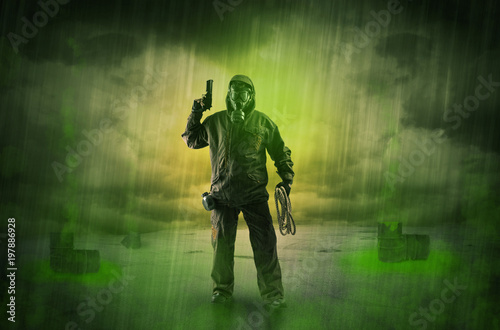 Masked unrecognizable guard in an abandoned space after explosion
