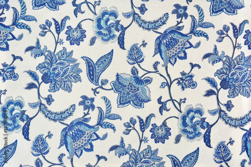 Blue ornate floral pattern on white cotton tablecloth. - obrazy, fototapety, plakaty 