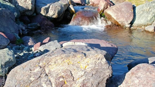 Rapids and stones of small mountain river Ih Sair in natural boundary Tsagduult,  Mongolia photo