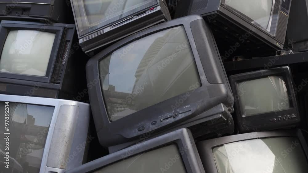 Tilt up VDO of old television, electronic junk, garbage, rubbish. Video