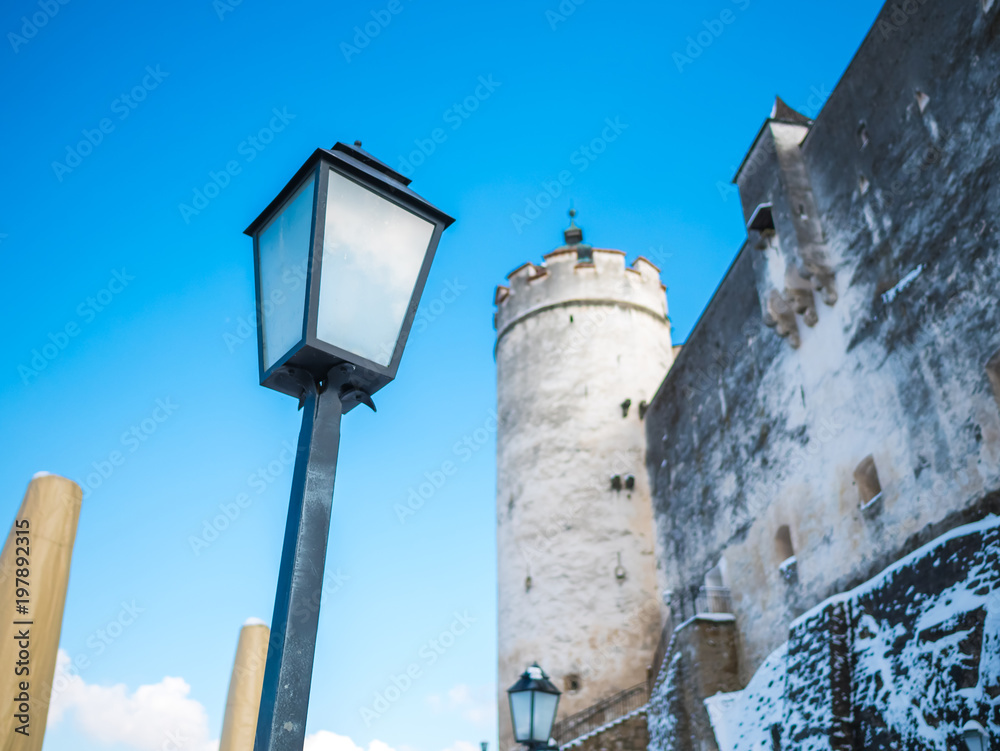 lamp light fortress castle blue sky salzburg austria winter snow