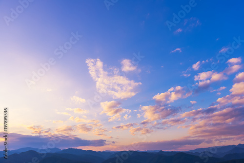 The rising sun, sky cloud sunrise abstract with mountain, background and fog © mr_gateway