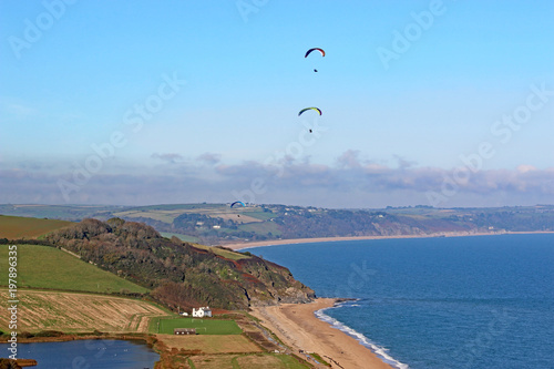Paragliders above Beesands beach