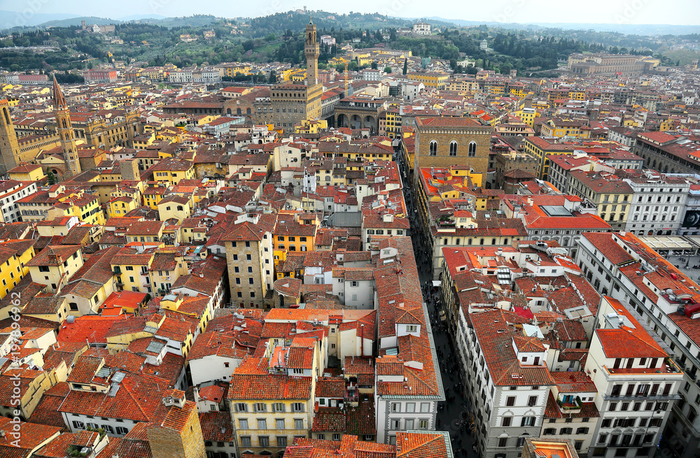 Obraz premium Aerial view of Florence old town from top of Florence Cathedral ( Cathedral of Saint Mary of the Flower ) Panoramic Aerial view from the top of Florence cathedral in Florence Italy ~ 