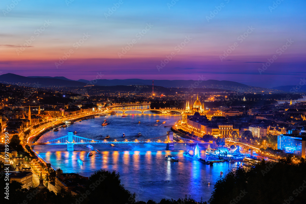 Budapest City At Blue Hour By The Danube River In Hungary