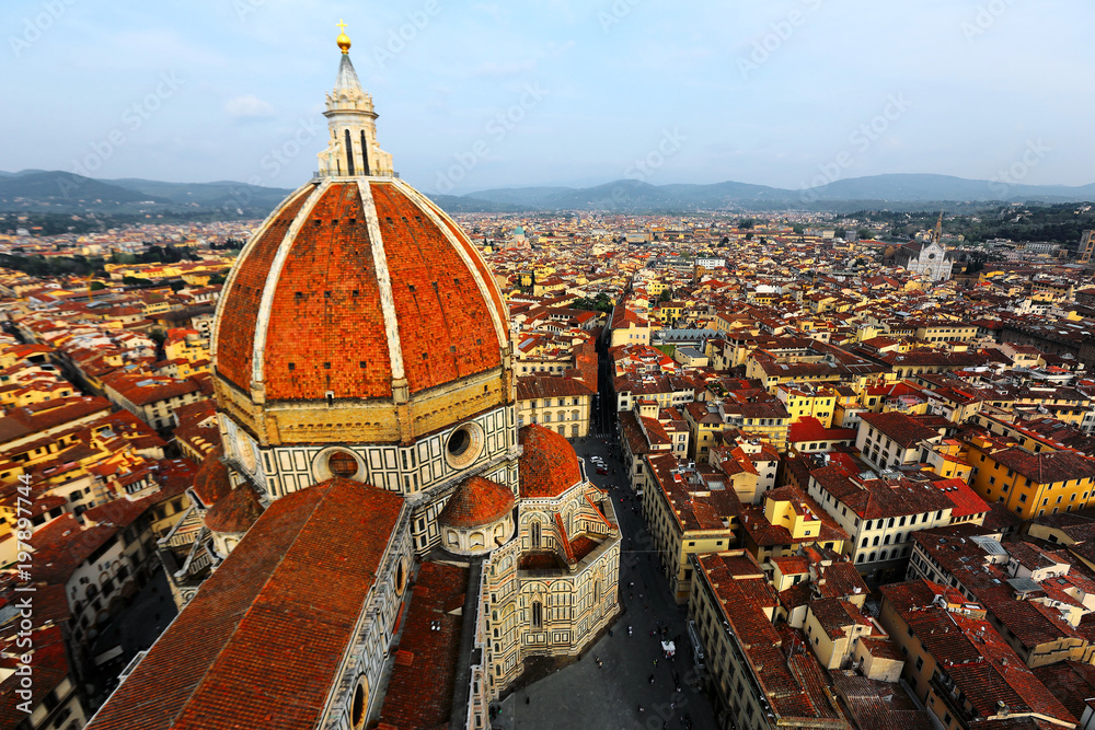 View of the Cathedral Santa Maria del Fiore in Florence, Italy ~ Florence's cathedral stands tall over the city with its magnificent Renaissance dome designed by Filippo Brunelleschi. 