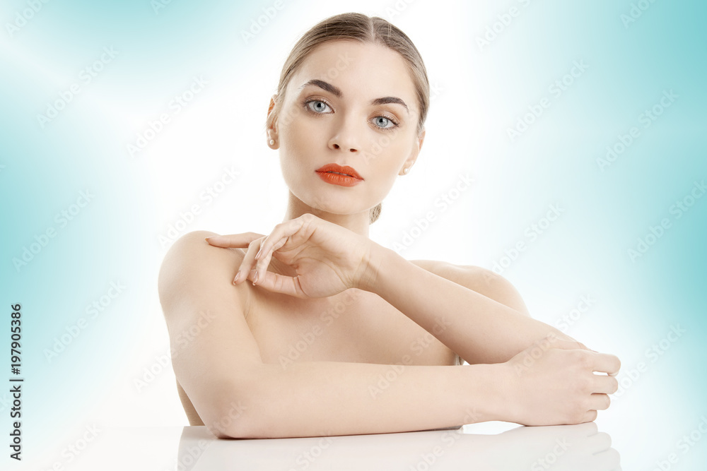 Naklejka premium Portrait of an attractive young woman with perfect skin, Beauty shot against isolated background