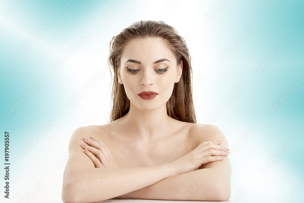 Obraz premium Portrait of an attractive young woman with perfect skin, Beauty shot against isolated background