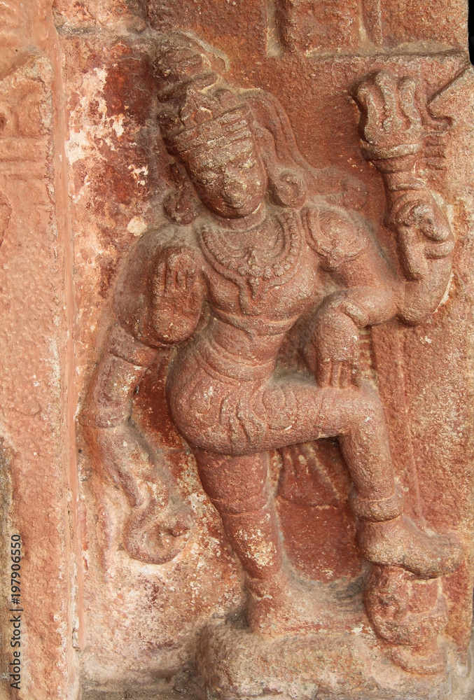 Stone bas-reliefs on the walls the temple complex Hemakuta hill in Hampi, Karnataka, India.