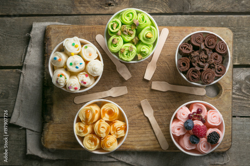 Fényképezés Selection of different rolled ice creams in cone cups